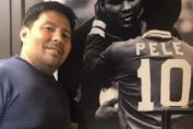 IN FRONT OF HIS IDOLS PELE AND ALI